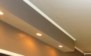 Hardwood floor, neutral tones, blue and grey furniture make up the Leasing Office at Summit Pointe in Oklahoma City, Oklahoma